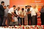 Chief Minister Sarbananda Sonowal lighting up the lamp during the launch ceremony of Guwahati-Dhaka flight under International A