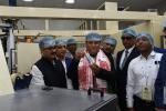 Chief Minister Sarbananda Sonowal being given a tour of the manufacturing plant of Essel Propack at Madanpur in Kamrup on 10.2.2
